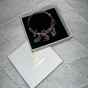 Silver Bracelet with Red and Brown Charms
